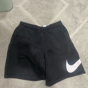 Nike Black and White Athletic Shorts with Swoosh Logo